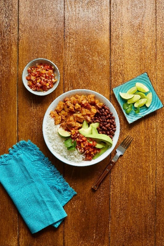 Brazilian-style pork with avocado and black beans